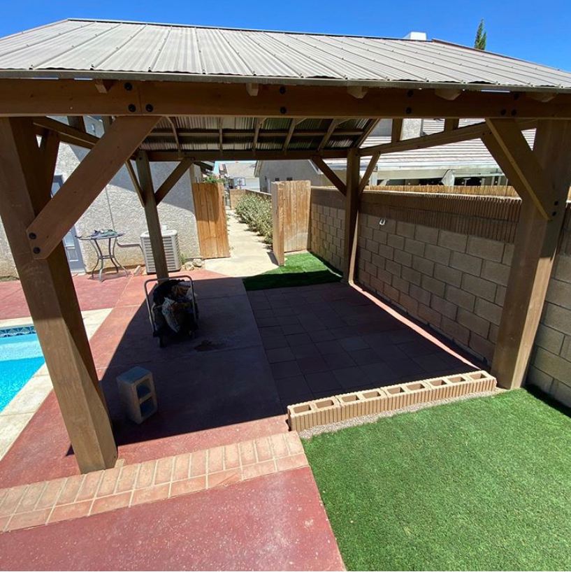 Artificial turf around patio area